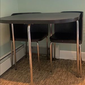 Table with hideaway chairs